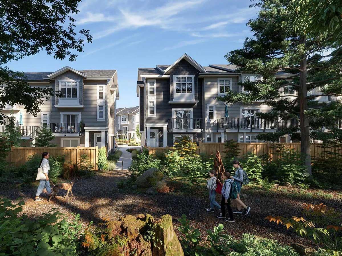Langley presale condos and townhomes surrounded by trees and green space, with families walking through landscaped pathways in a new construction community.