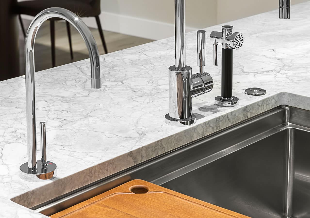 Close-up of premium marble countertop and modern kitchen fixtures at 1535 Howe Vancouver by Onni showcasing luxury finishes and craftsmanship at 1335 Howe Street in Downtown Vancouver.