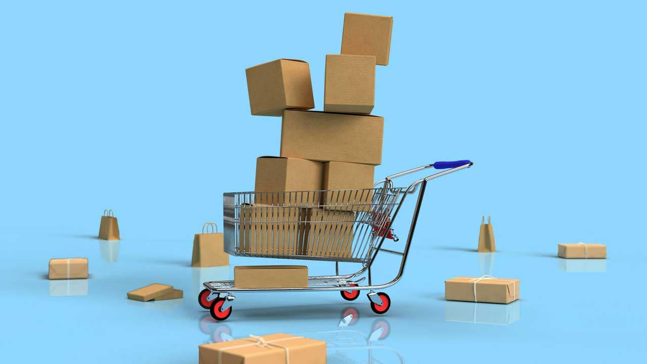Shopping cart stacked with cardboard boxes representing steep discounts on Vancouver presale condos