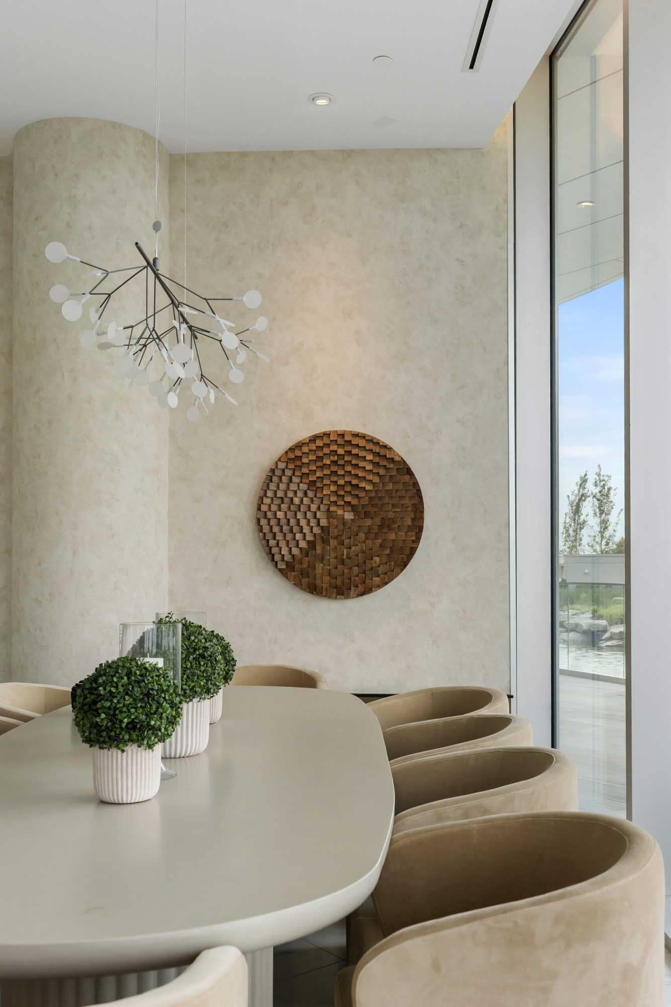 Private dining room amenity at Icon at Southgate City Burnaby with elegant finishes and views of the landscaped outdoor spaces.