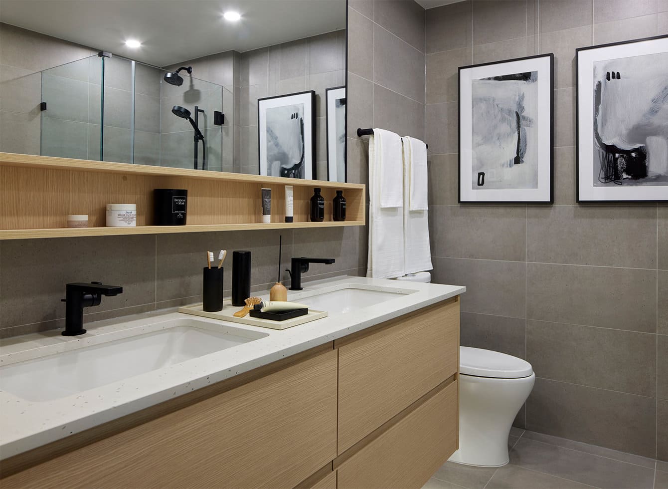Modern bathroom with quartz vanity at Timber House New Westminster by Aragon