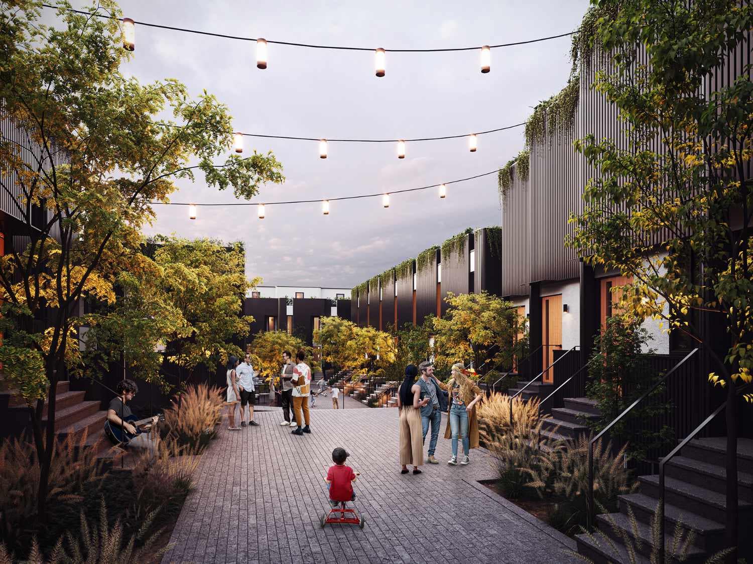 Amenity courtyard at The Cut East Vancouver with gathering spaces and landscaped pathways.
