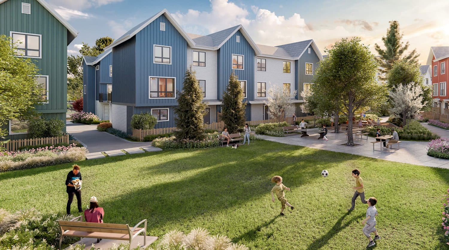 Central landscaped courtyard at Mercer Village New Westminster by Domus Homes located at 388 Duncan Street in the Queensborough neighbourhood of New Westminster. Families and children gather around open lawn areas