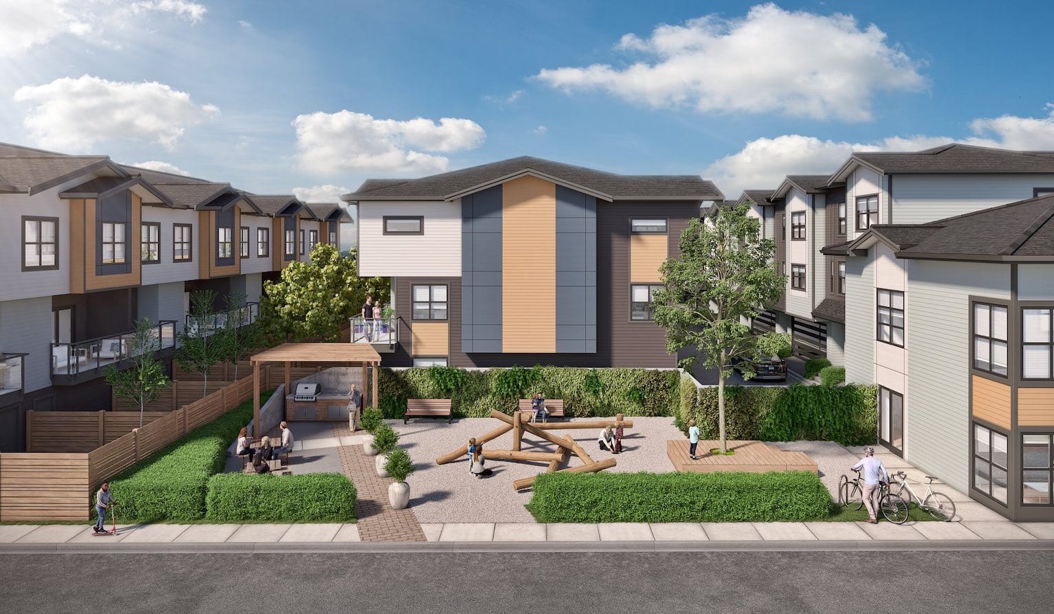 Playground and outdoor amenity area at Elwynn Green Fleetwood townhomes in Surrey.