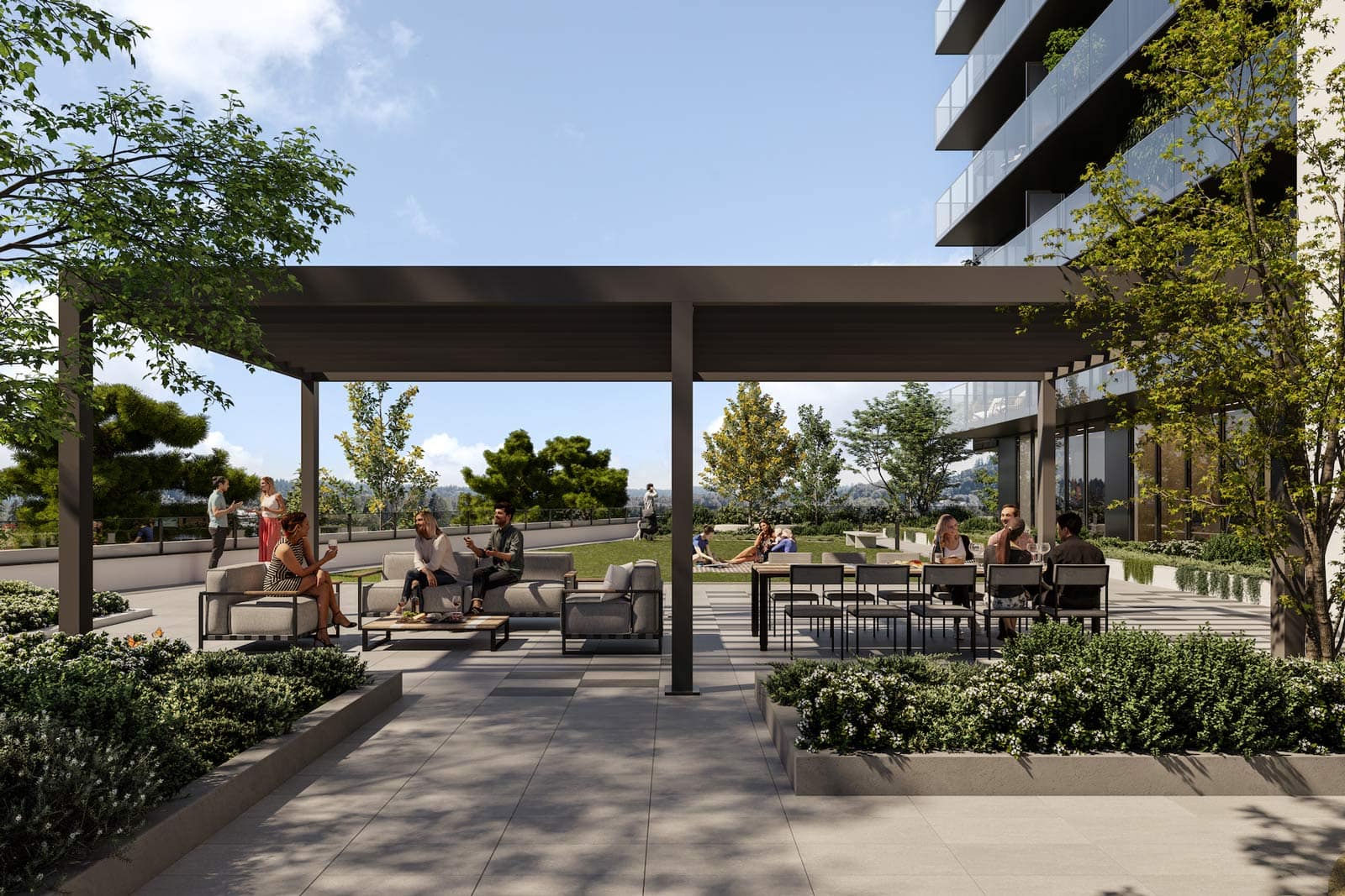 Outdoor amenity terrace at Town & Centre by Mosaic in Coquitlam Town Centre with seating areas, landscaped greenery, and social spaces at 3650 Westwood Street