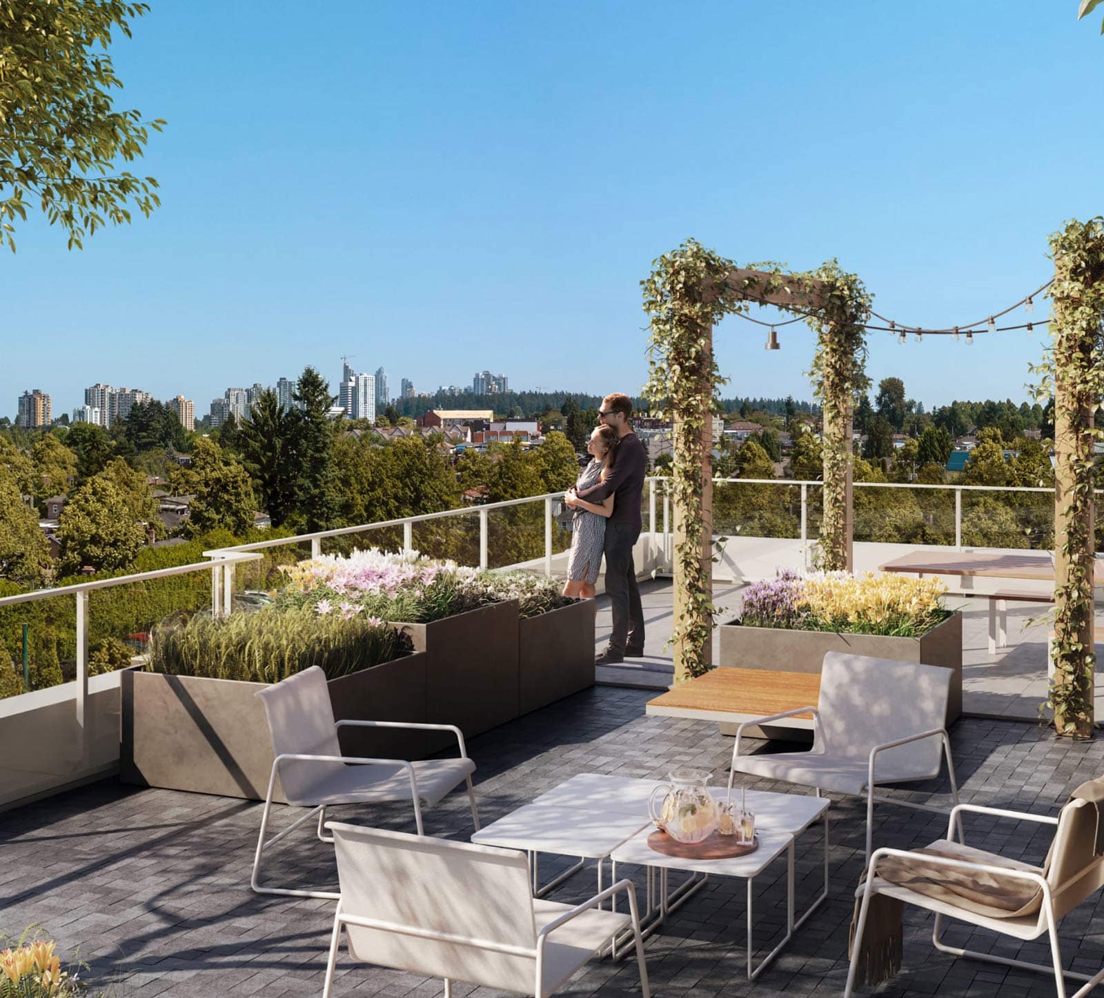Rooftop terrace at Frame Vancouver in Collingwood featuring lounge seating, landscaped planters, pergola, and panoramic city views near 5189 Earles Street.