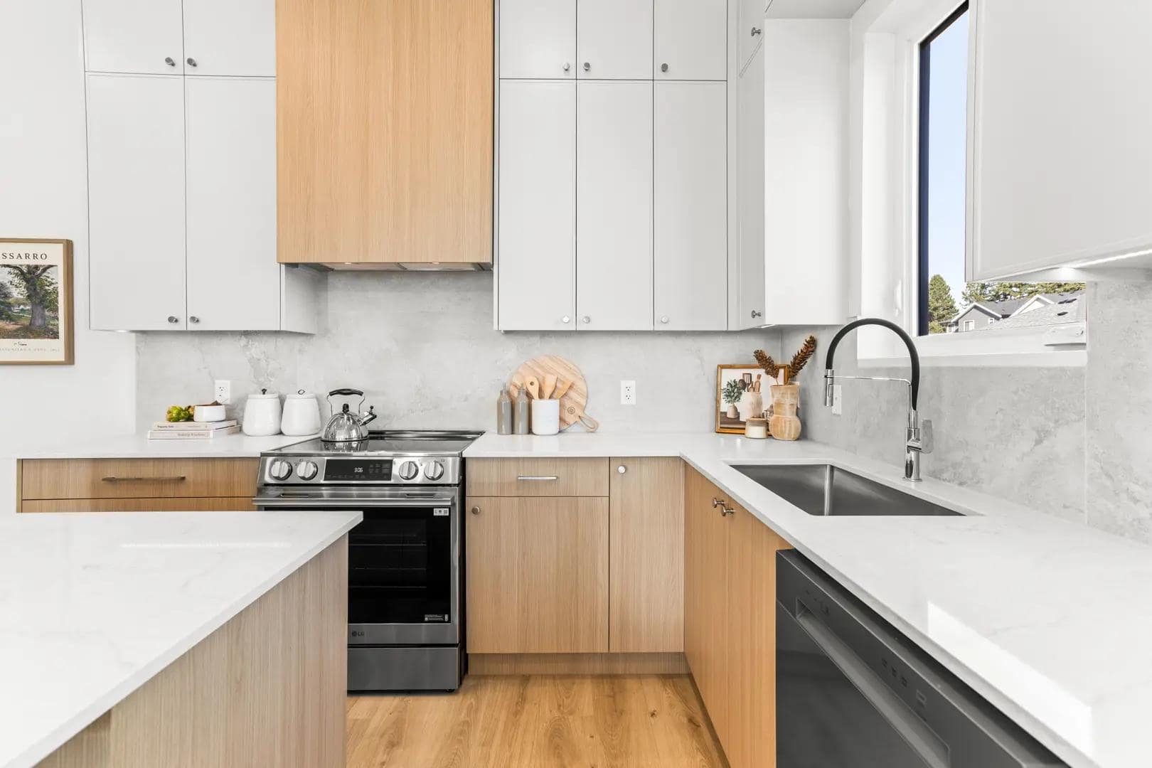 Modern kitchen at Edgewood South Surrey presale homes by Northwest Development located at 16775 21 Avenue