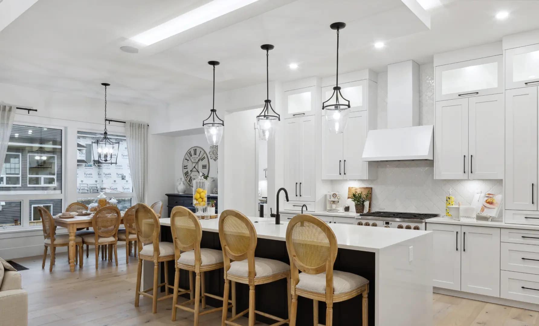 Luxury kitchen interior at Brookswood Estates Langley by Foxridge Homes with oversized island seating, custom cabinetry, and bright open living space.