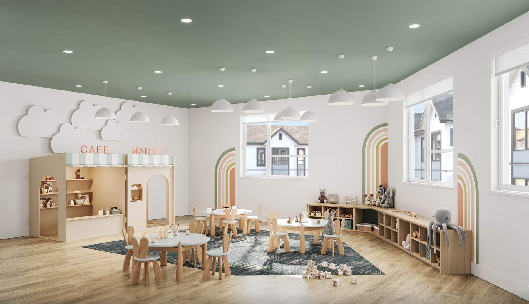 Childrenโs playroom at Nature Haus Fleetwood featuring soft seating, play tables, and family-friendly design at 16487 89 Avenue Surrey by Isle of Mann Property Group