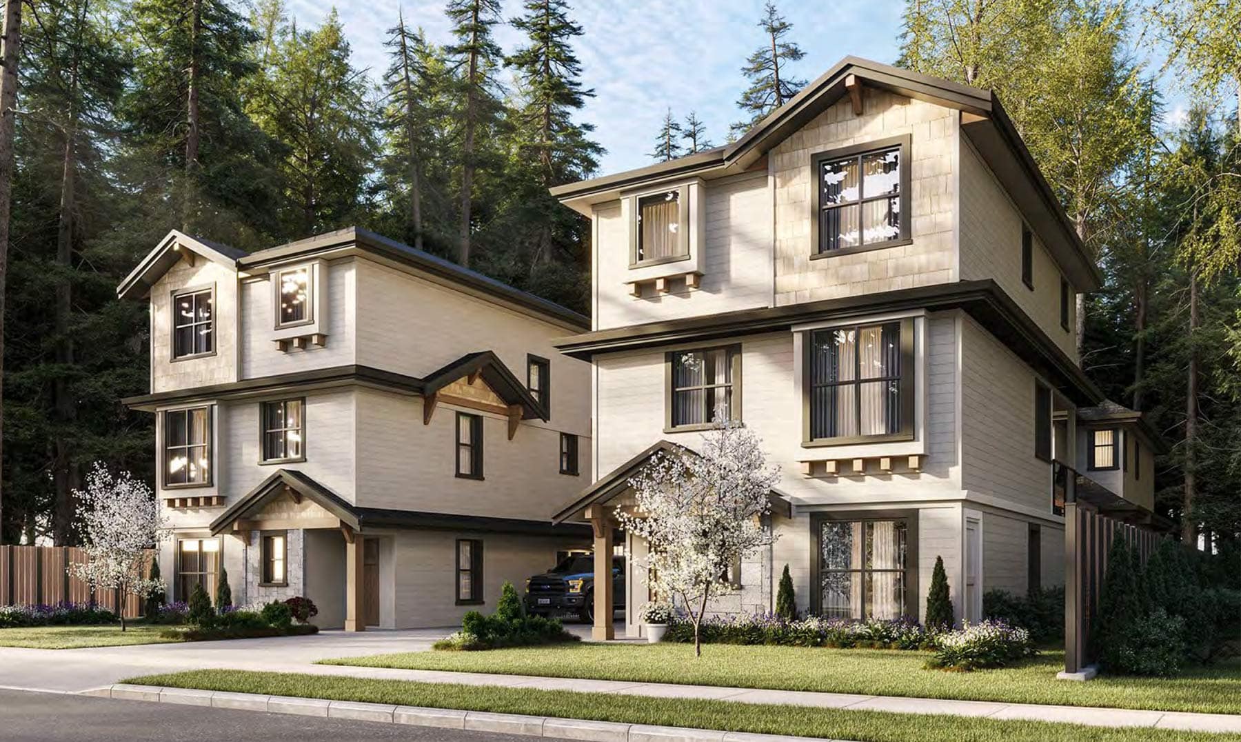 Angled exterior view of detached homes at 7609 Coldicutt Burnaby showing landscaping, driveway, and architectural details at 7609 Coldicutt Street in The Crest by ICON Projects & Costar Construction.