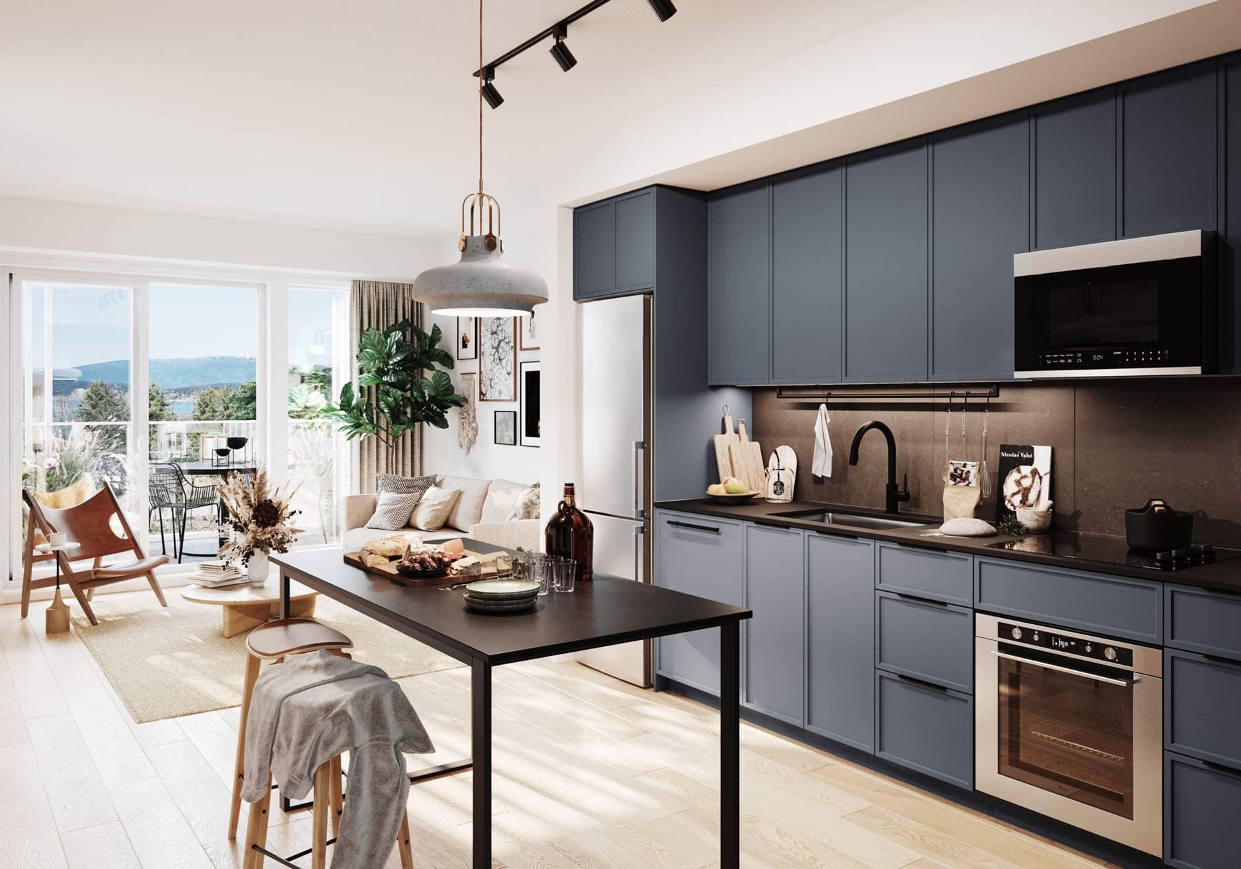 Kitchen and living space at Moody Yards Port Moody with island, dining setup, and open layout by Mosaic at 3015 Murray Street
