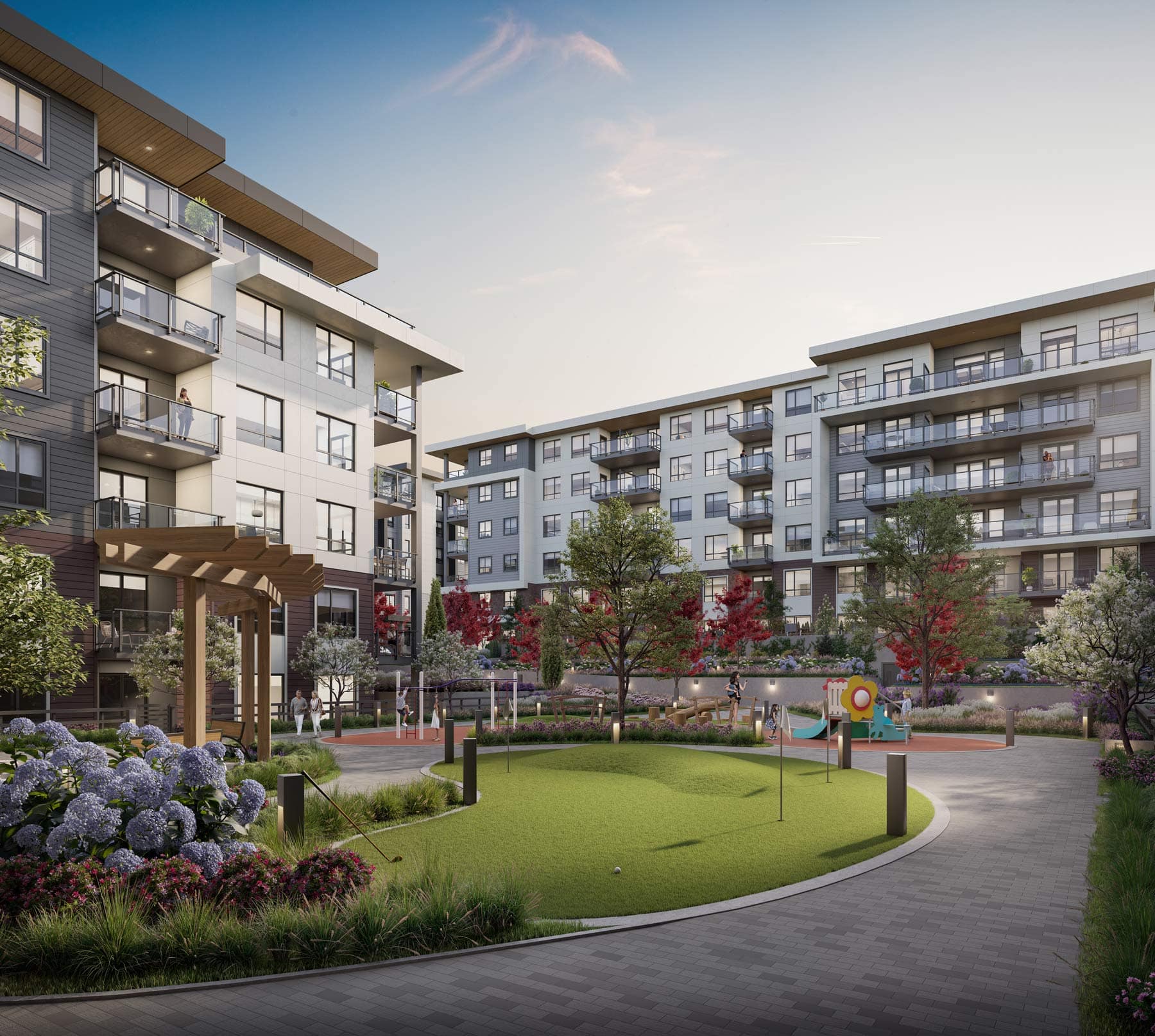 Central courtyard at Eden Langley featuring landscaped gardens, seating areas, and play space within the condo community in Willoughby