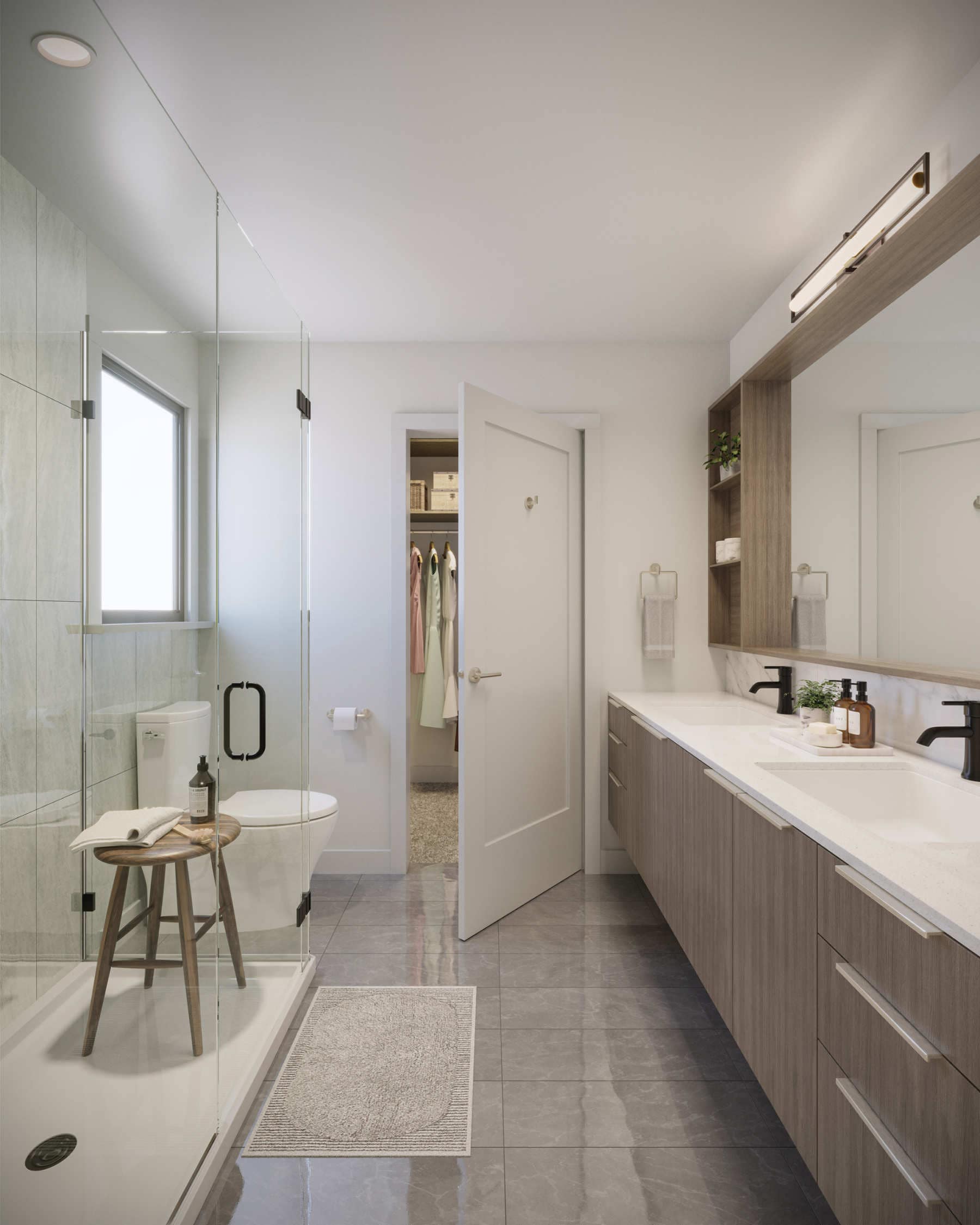 Modern bathroom at Amson Bloc Surrey featuring neutral tile palette, glass shower enclosure, double vanity, and sleek cabinetry at 5937 144 Street Panorama Ridge by Amson Group