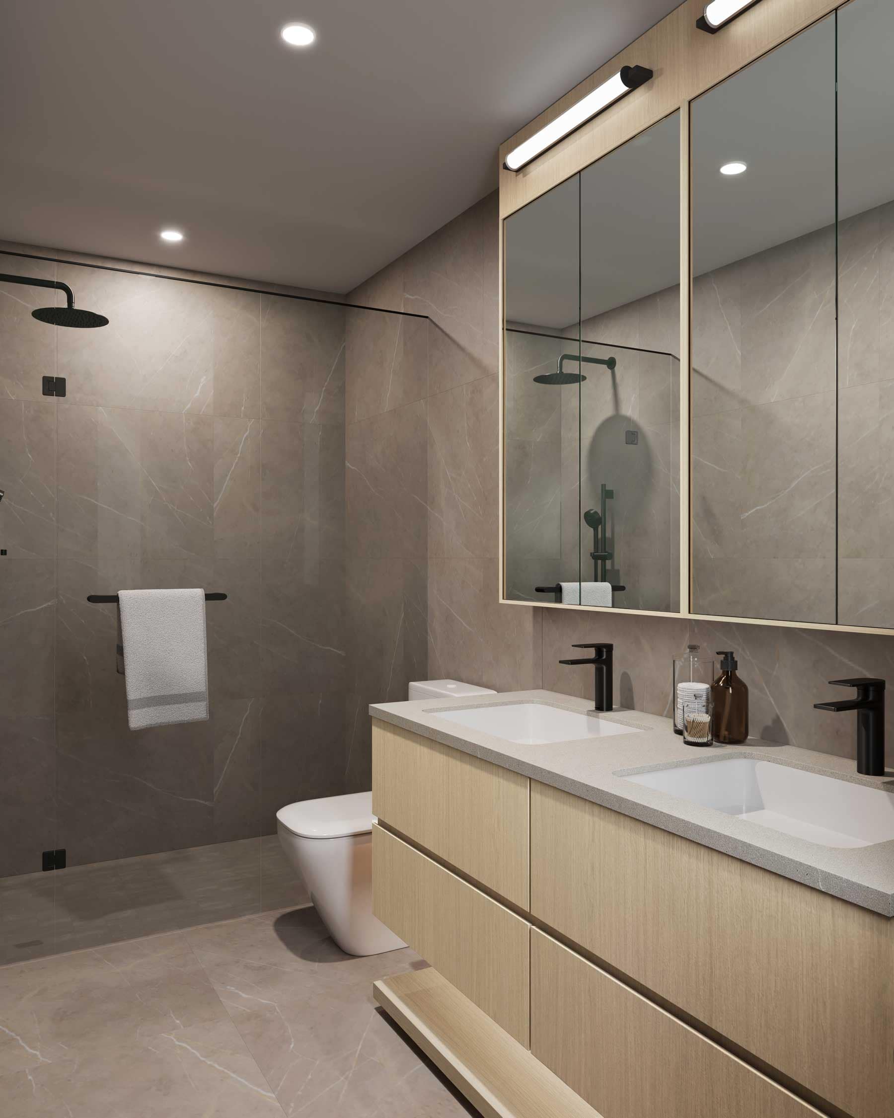 Luxury ensuite bathroom at Be W 49th Vancouver with double vanity, large-format tile, frameless glass shower, integrated mirror lighting, and modern oak cabinetry designed by Modella Developments in Oakridge.