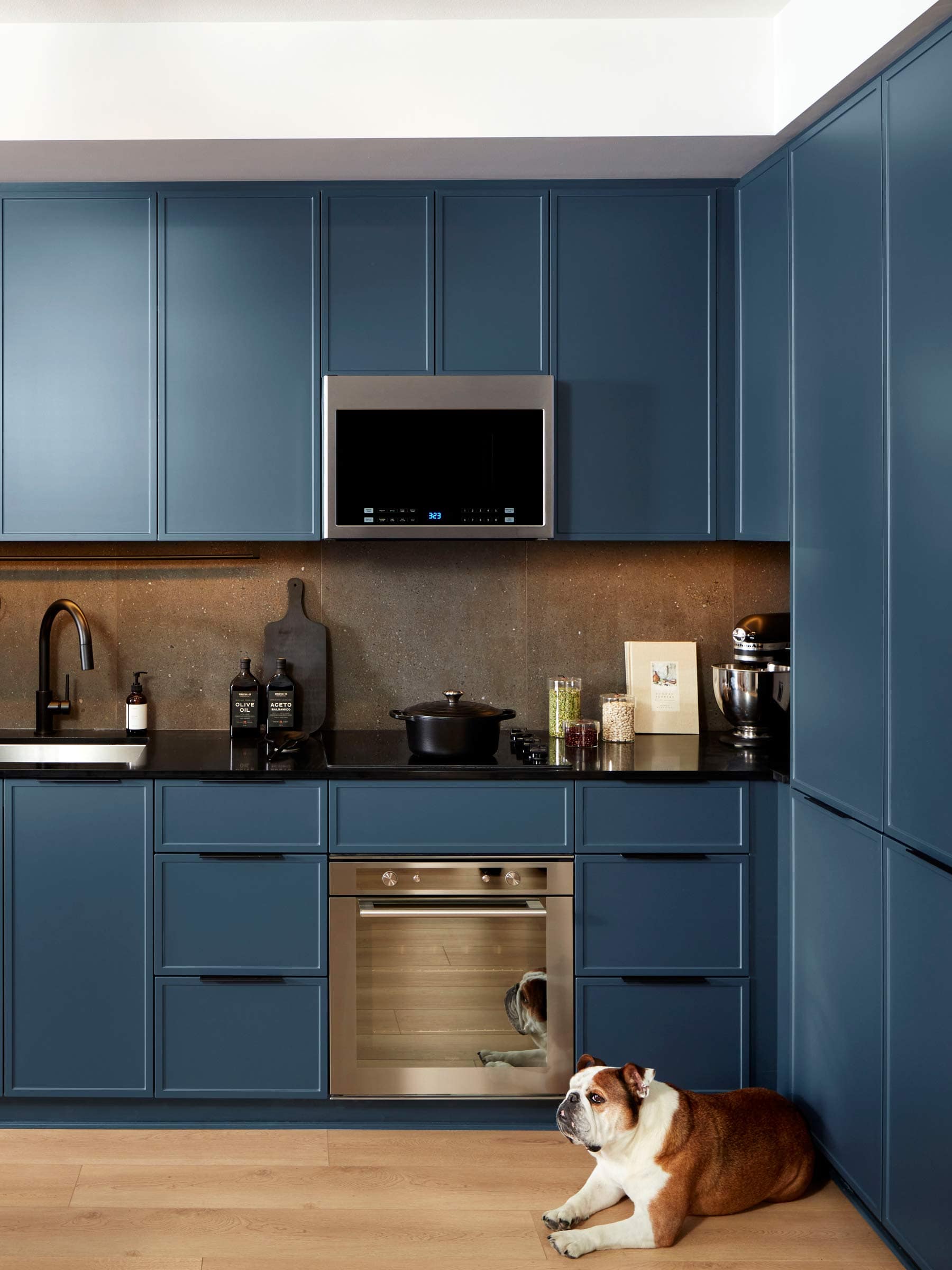 Close-up of kitchen cabinetry and appliances at Moody Yards Port Moody by Mosaic at 3015 Murray Street