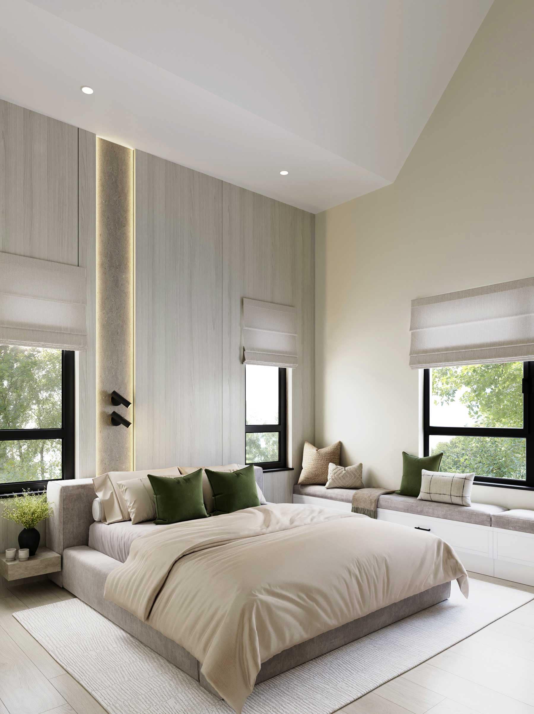 Primary bedroom interior at Bromley Langley by Leone Homes featuring vaulted ceilings, oversized windows, custom wall detailing, built-in seating, and soft contemporary finishes at 20815 45A Avenue in Langley.