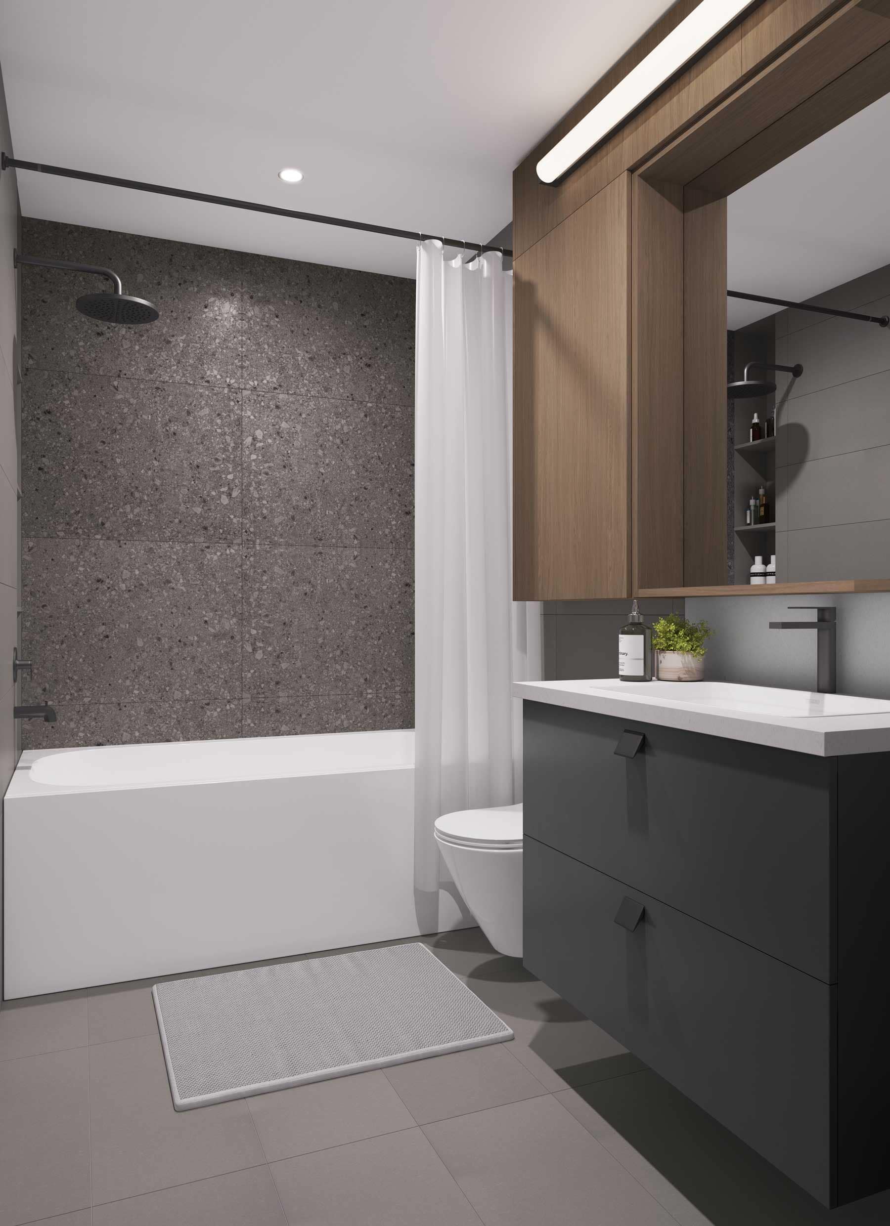 Dark contemporary bathroom interior at Be W 49th Vancouver with charcoal terrazzo-style wall tile, floating vanity, matte black fixtures, and integrated storage in the Oakridge project by Modella Developments.