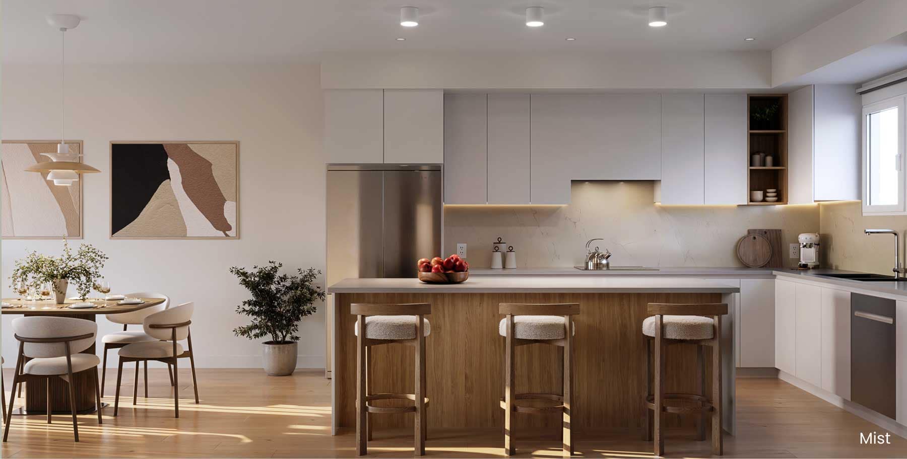 Kitchen and dining area at Rocklin Burke Mountain by StreetSide in Coquitlam, featuring the Mist colour palette, oversized island, light cabinetry, modern fixtures, integrated storage, and bright open living space.