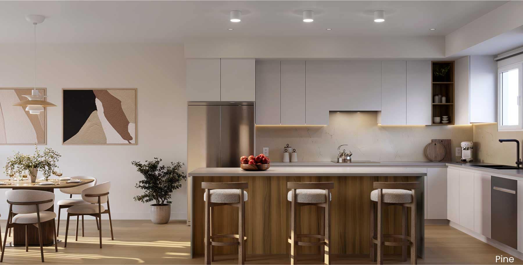 Kitchen and dining area at Rocklin Burke Mountain, a StreetSide presale development at 1295 Rocklin Street in Coquitlam, featuring the Pine colour palette, large island seating, wood cabinetry, stainless steel appliances, and open-concept layout.