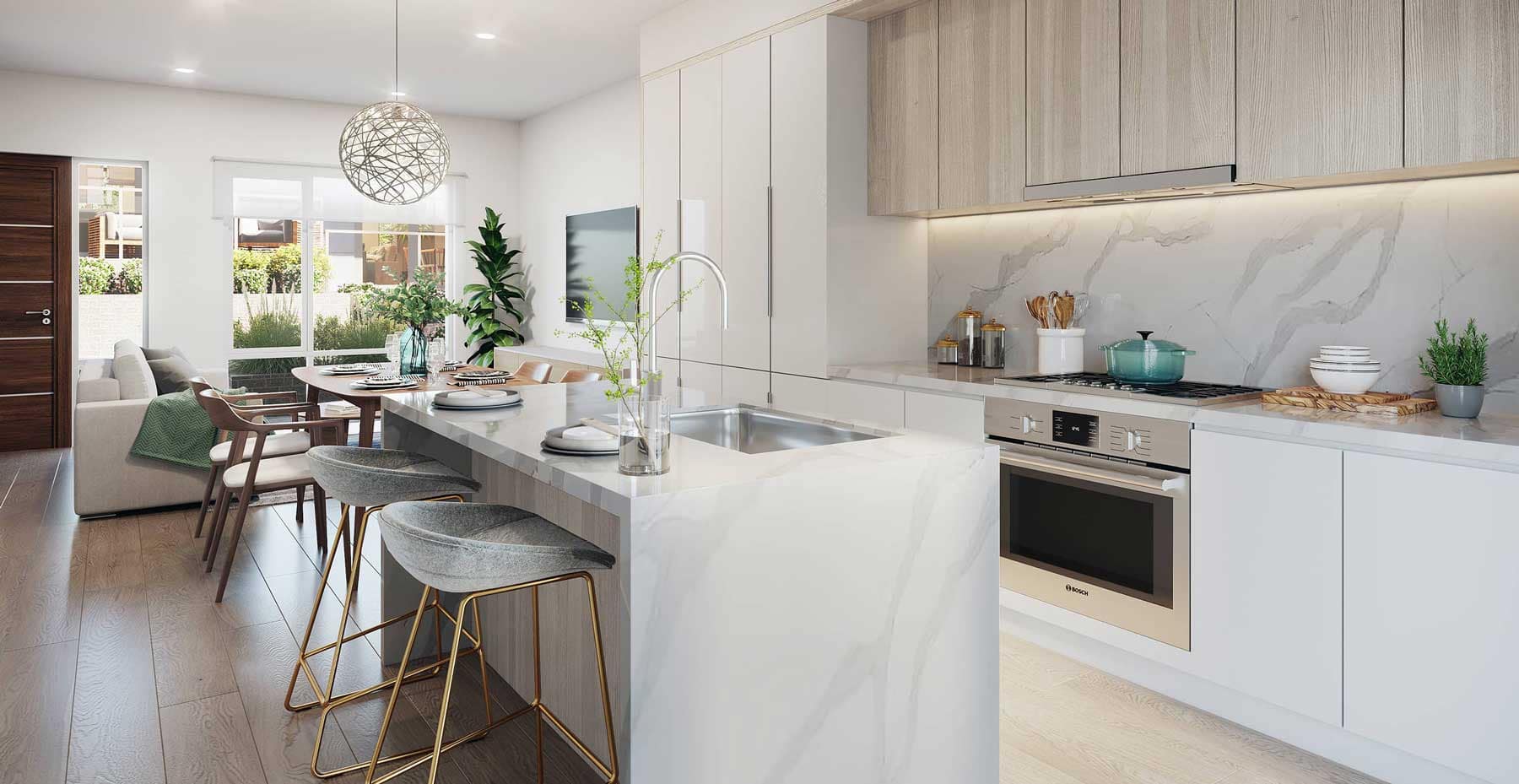 Contemporary gourmet kitchen at West58 Vancouver by Azora Group with Bosch appliances, quartz countertops, custom cabinetry, and a spacious island.