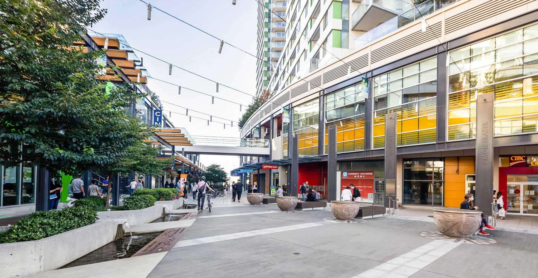 Vibrant shopping promenade near West58 Vancouver featuring restaurants, cafés, retail shops, and pedestrian-friendly public spaces close to 7425 Granville Street.