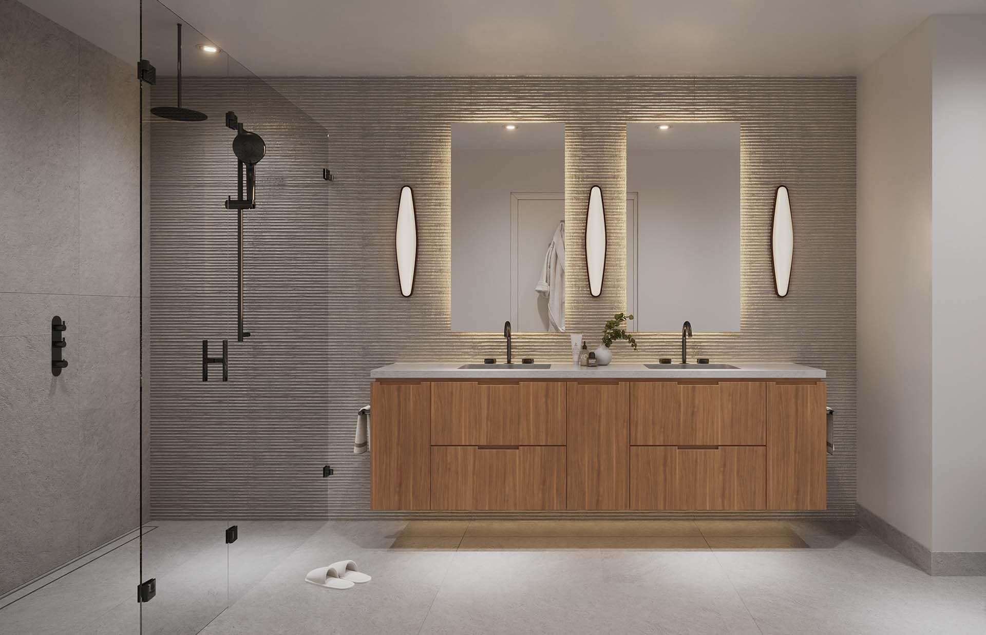 Elegant bathroom at Nolia Vancouver with dark wood vanity and backlit mirrors