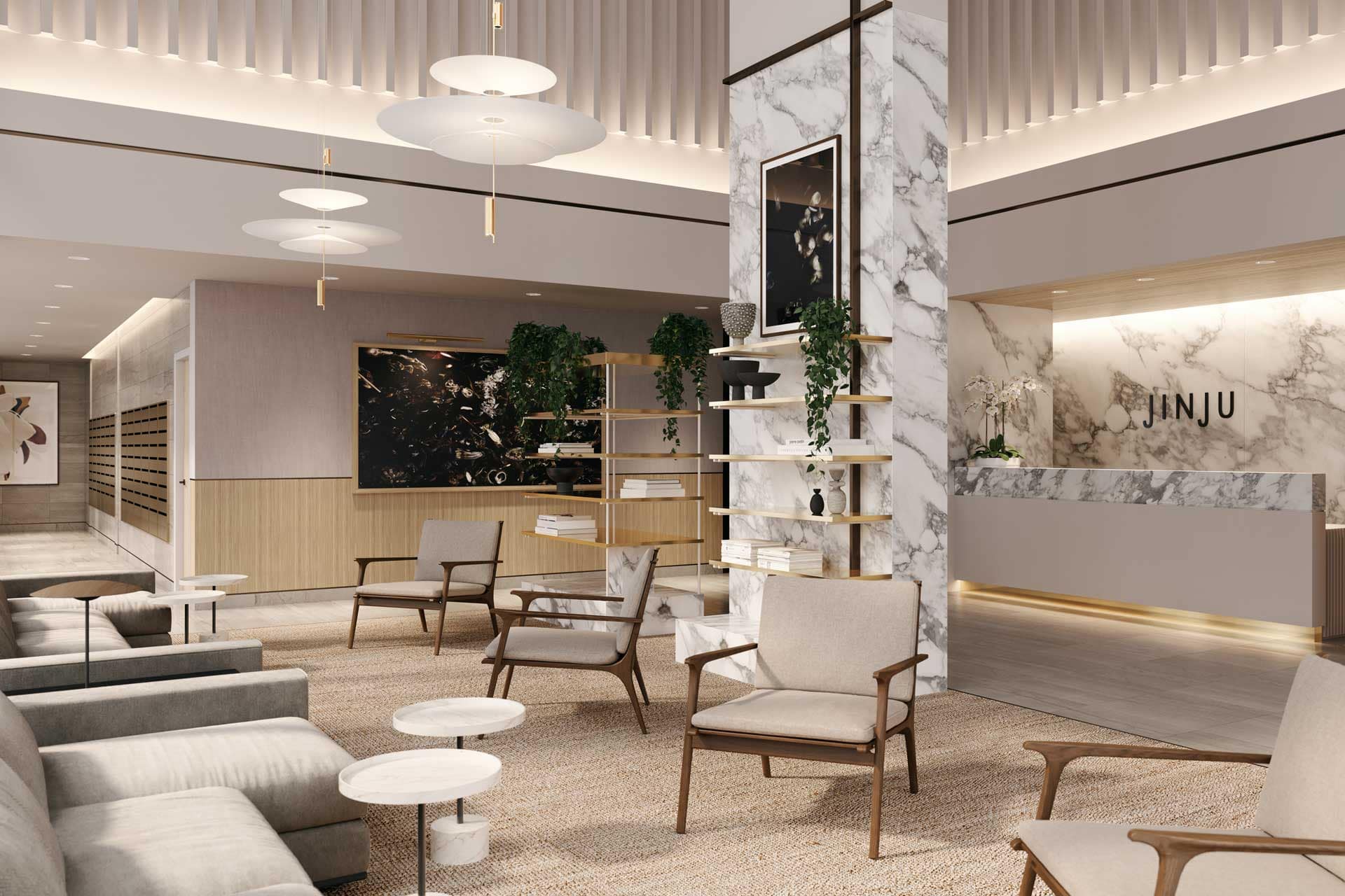 Lobby interior at Jinju Coquitlam by Anthem Properties in Burquitlam, 533 Cottonwood Avenue, showcasing marble finishes, lounge seating, shelving, and concierge-style reception area.