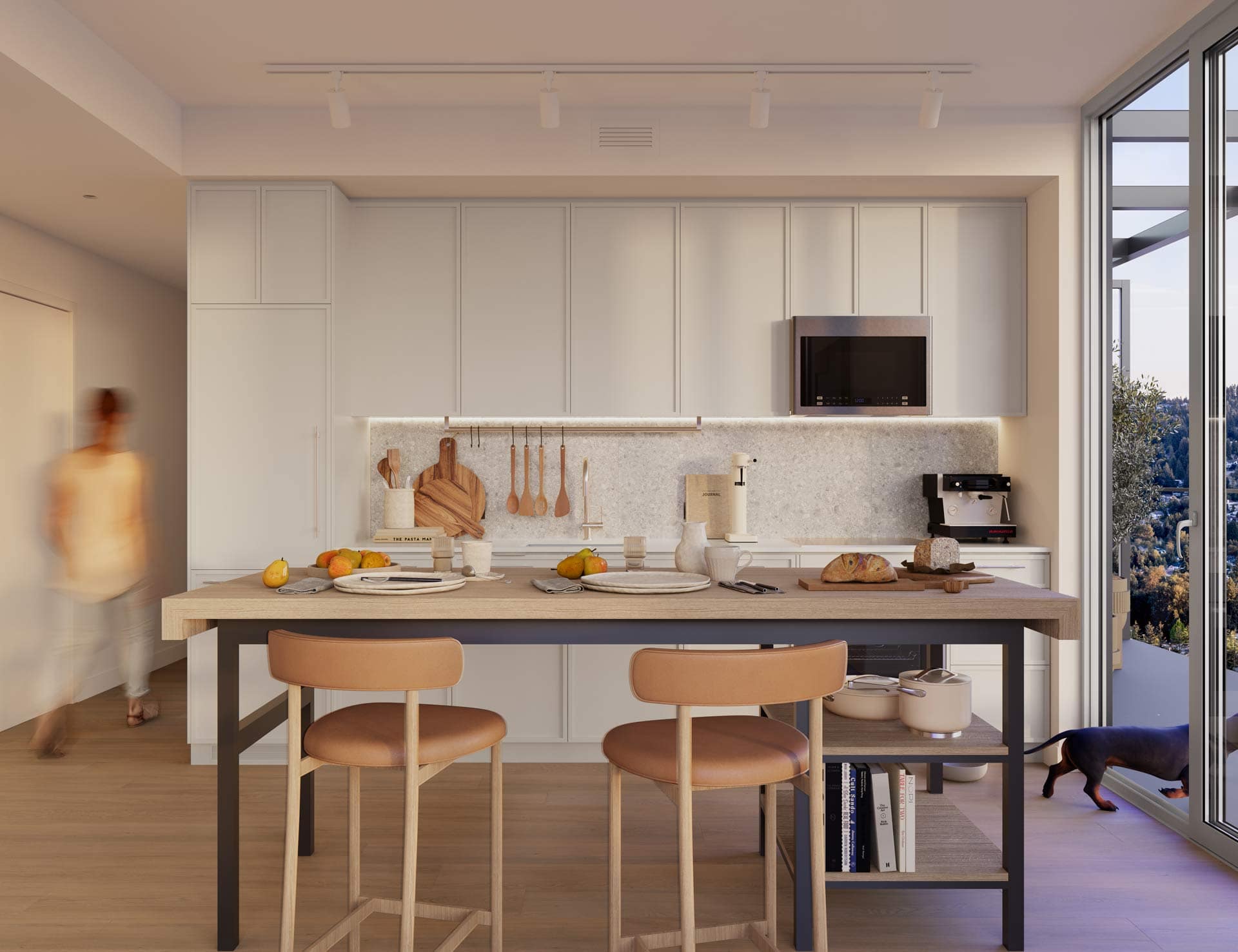 Bright kitchen interior at Town & Centre by Mosaic in Coquitlam Town Centre with light cabinetry, island seating, and modern appliances at 3650 Westwood Street