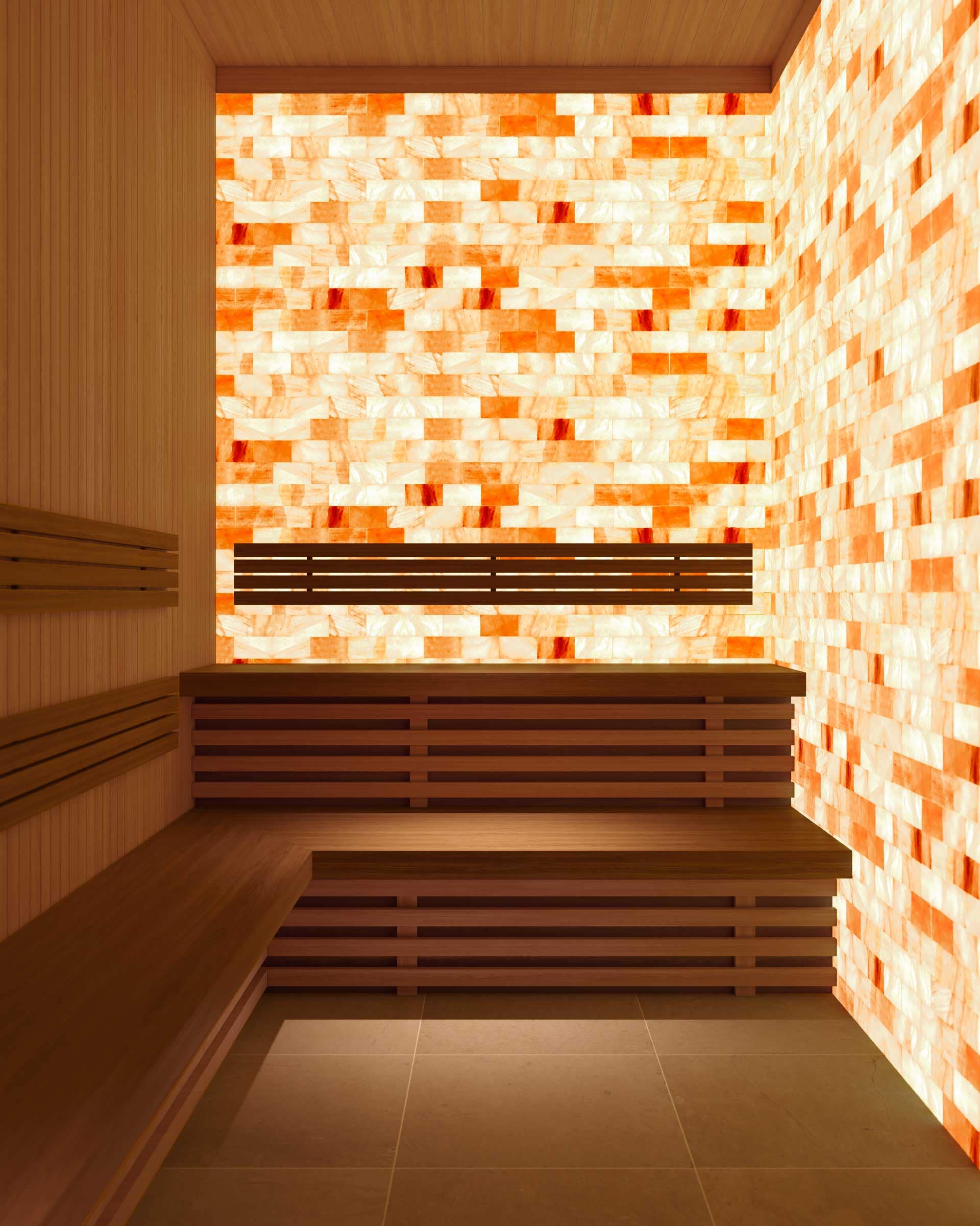 Salt sauna at Jinju Coquitlam by Anthem Properties in Burquitlam, 533 Cottonwood Avenue, featuring illuminated salt walls, wood benches, and spa-like atmosphere.