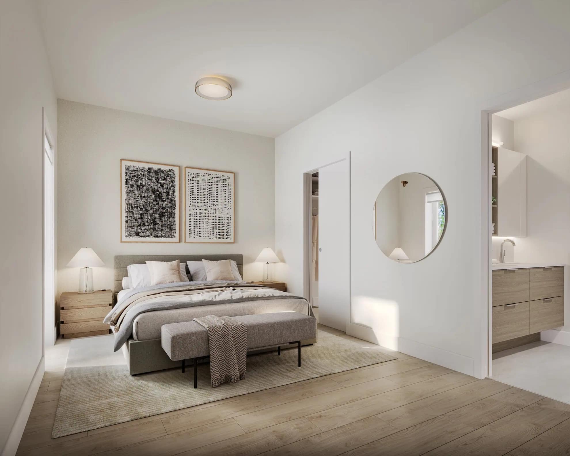Bedroom interior at The PoCo Port Coquitlam showing a bright, minimalist layout with large windows, soft neutral tones, and access to an ensuite, designed for comfortable living at 2431 Mary Hill Road in Central Port Coquitlam