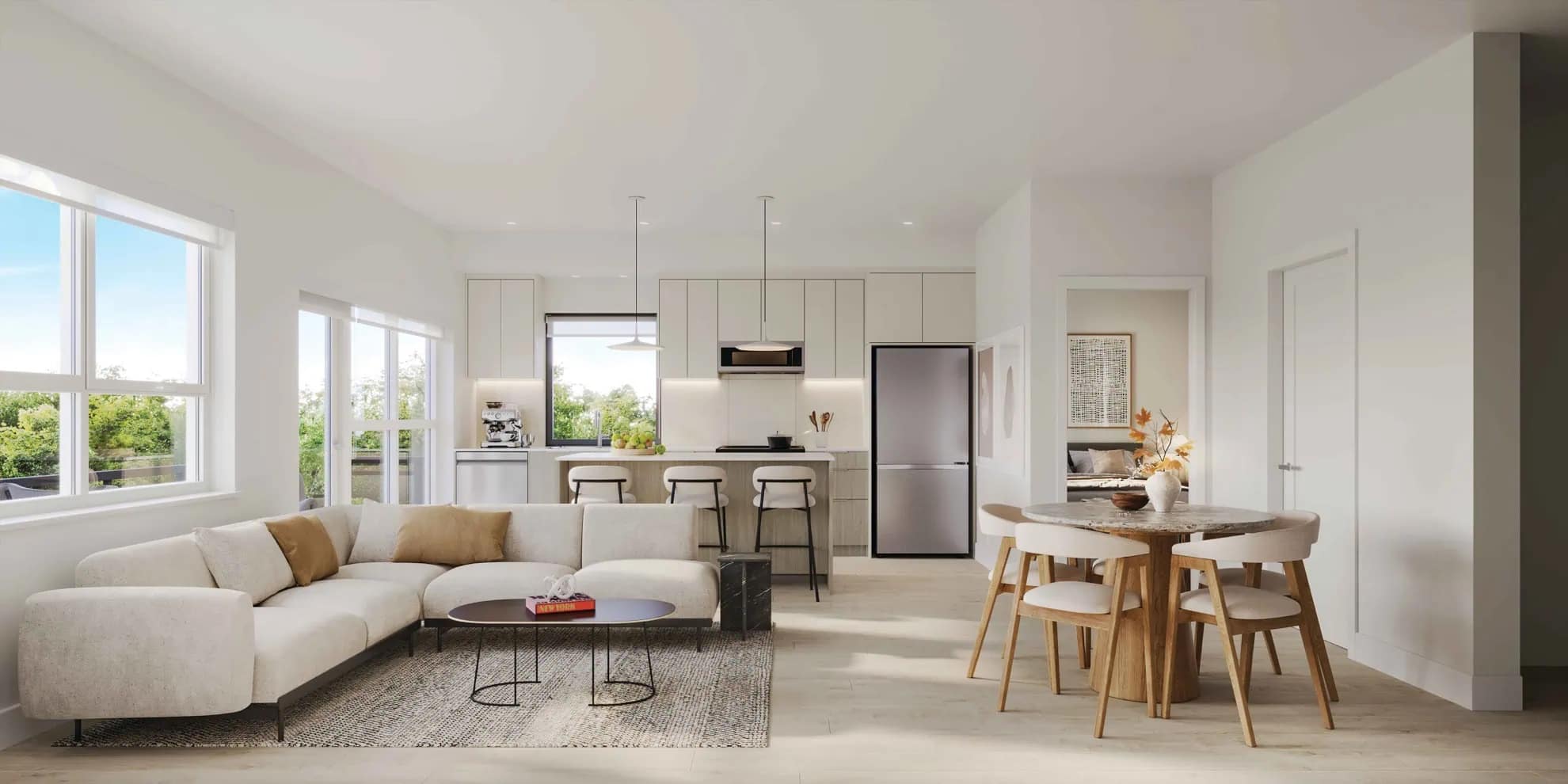 Open-concept living and dining area at The PoCo Port Coquitlam with a modern kitchen, large windows, natural light, and contemporary furnishings, located at 2431 Mary Hill Road in Central Port Coquitlam