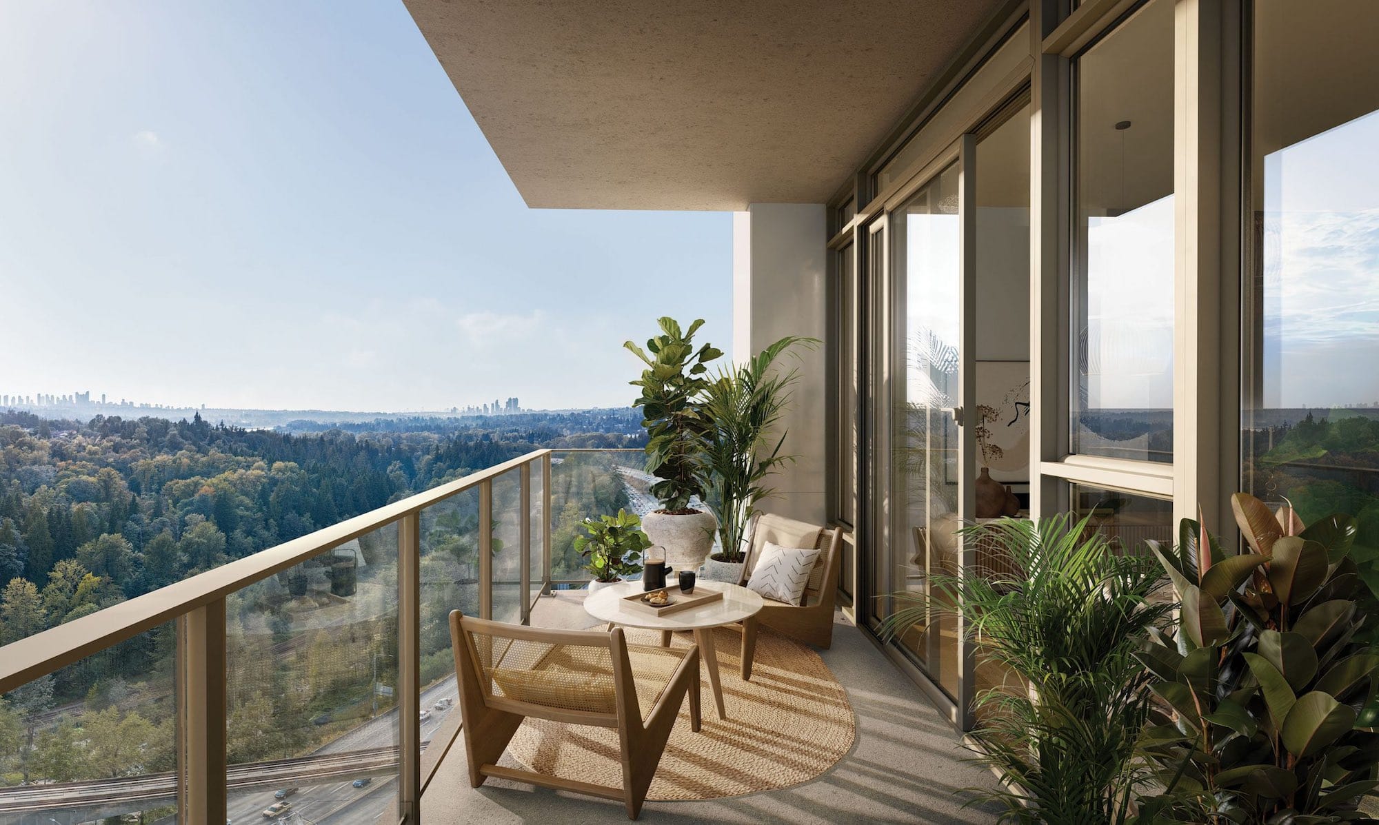 Private residential balcony at Soco Two Coquitlam presale condos by Anthem located at 311 Alderson Ave in Coquitlam’s Maillardville neighbourhood featuring outdoor seating