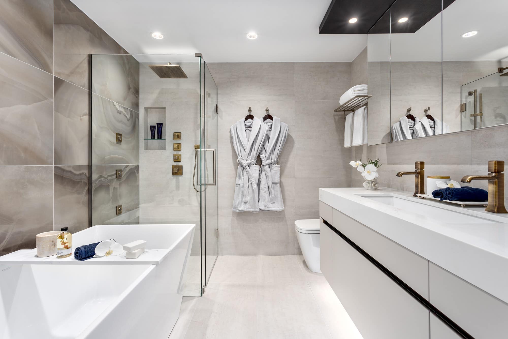 Luxury ensuite bathroom with soaker tub and double vanity at Italia by Solterra Vancouver