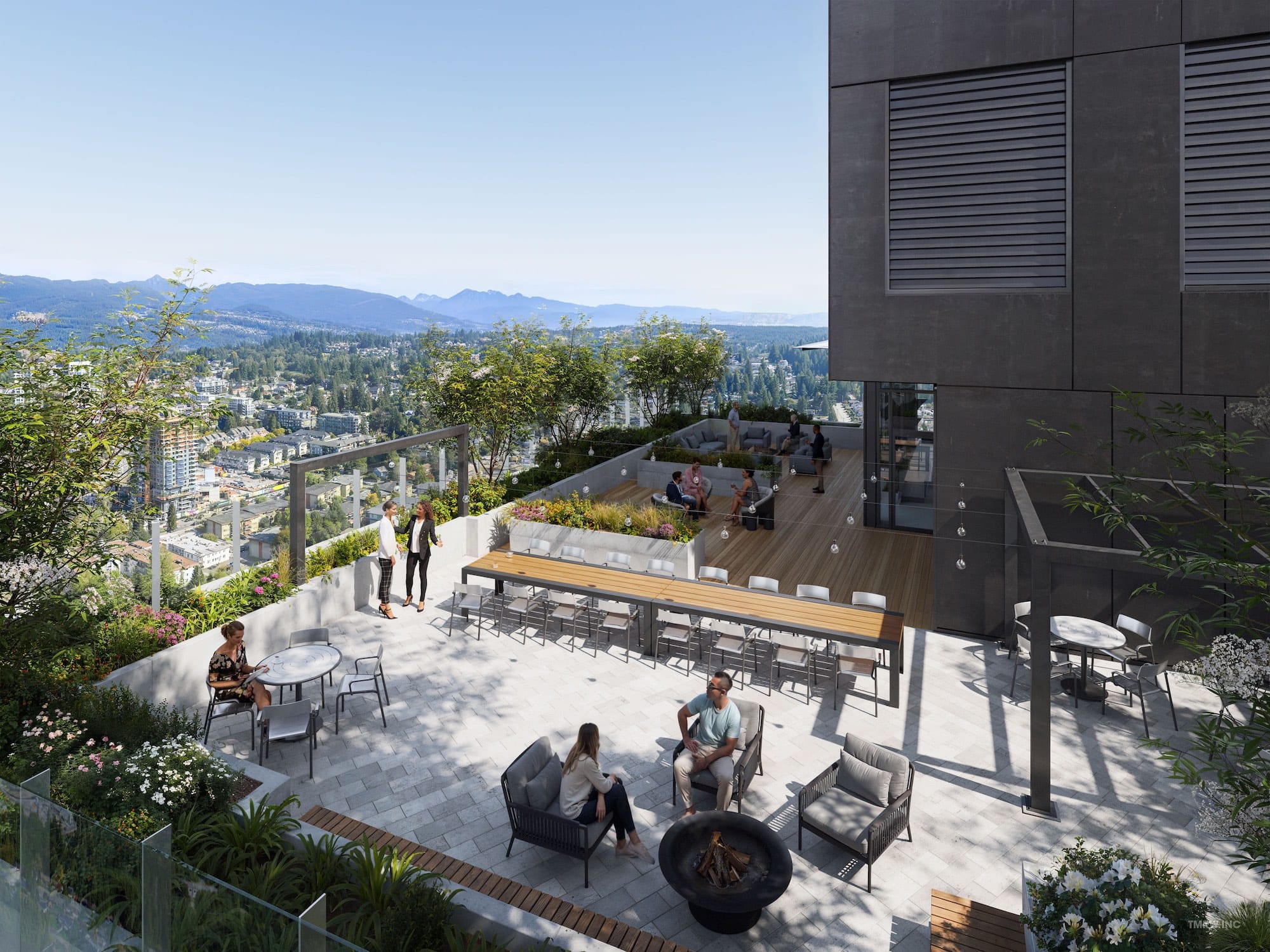 Rooftop terrace at Band Coquitlam overlooking North Shore Mountains