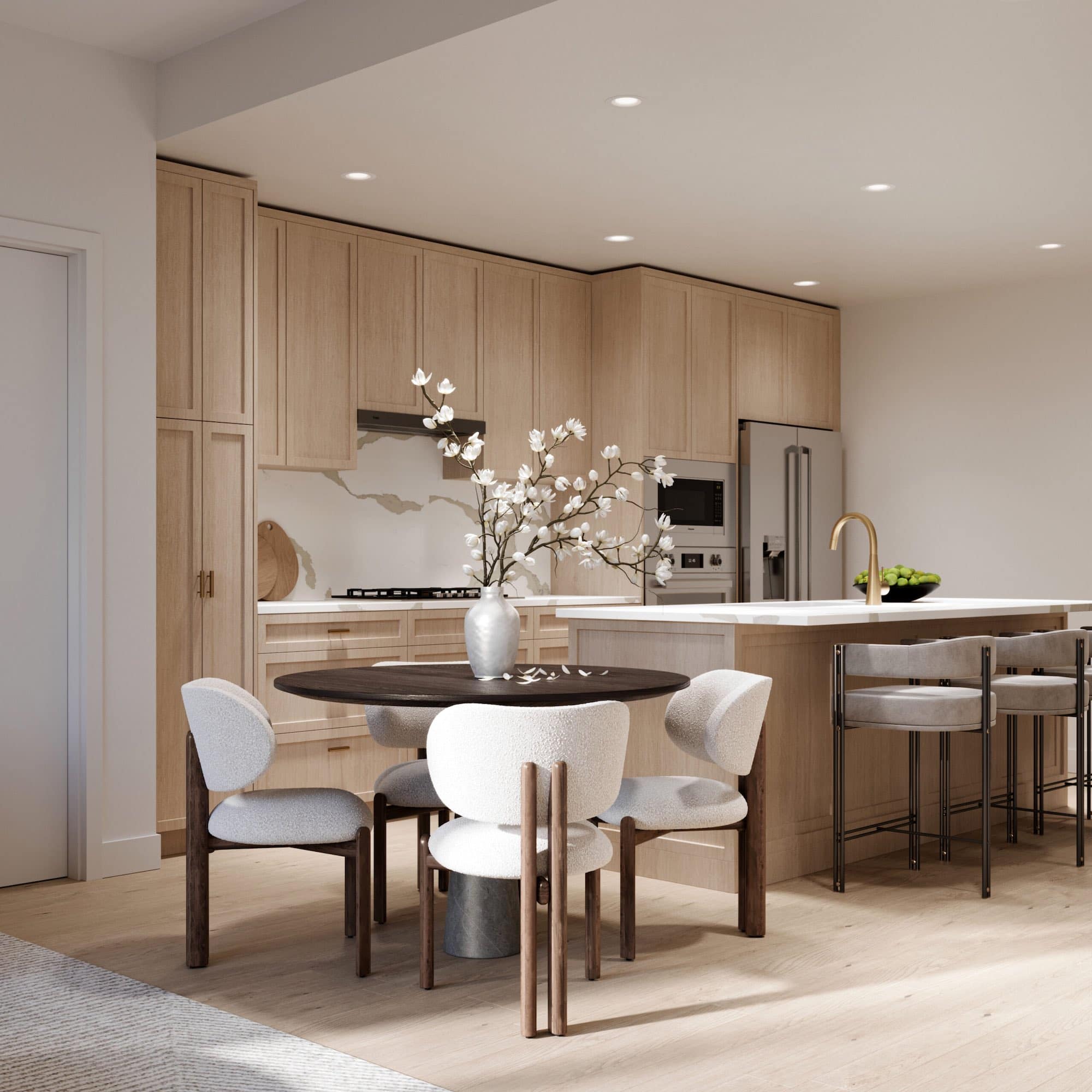 Dining area and kitchen interior at Siena Burnaby by Landa Global Properties located at 4451 Hastings Street in Burnabyโs Vancouver Heights neighbourhood. The space includes a round dining table with upholstered chairs