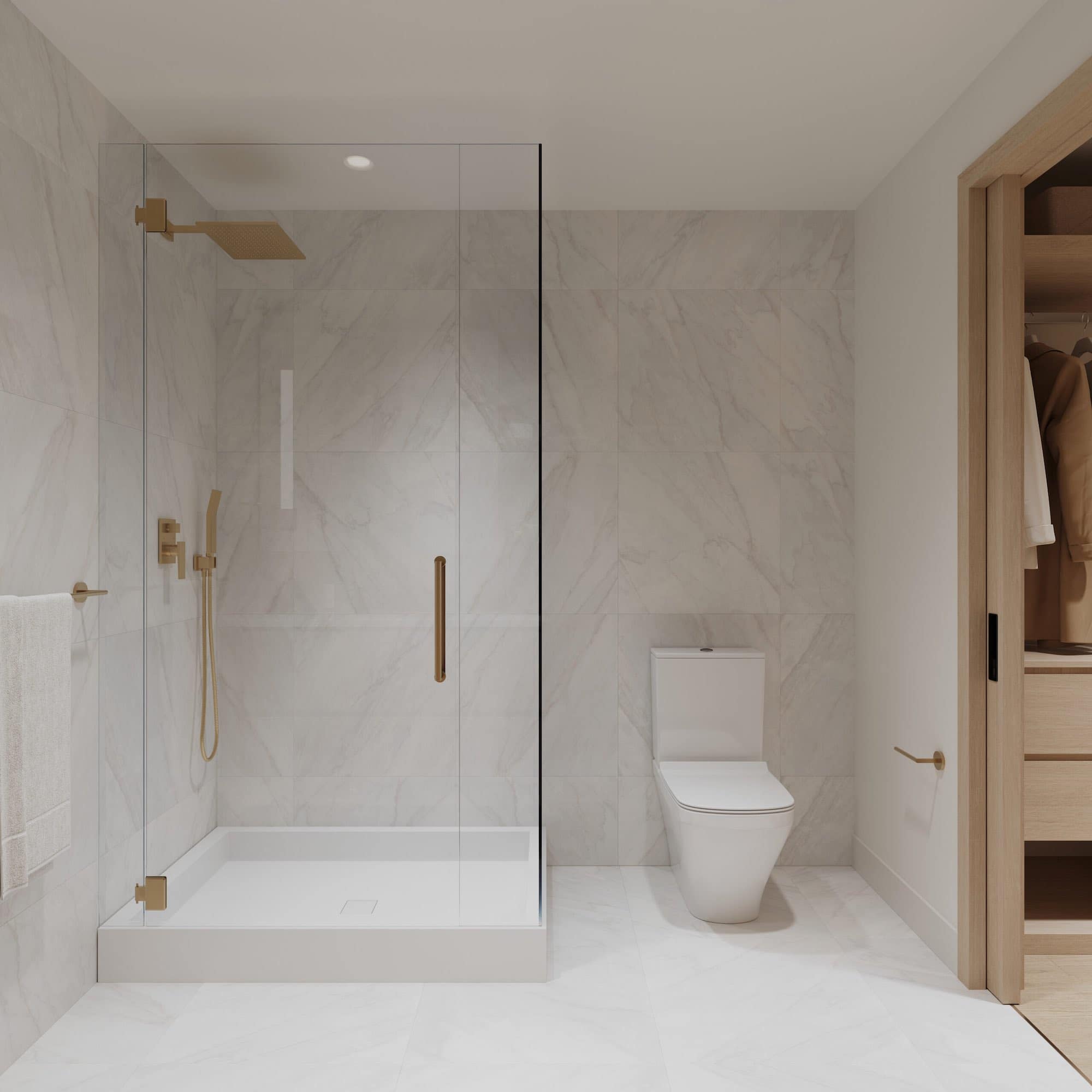 Bathroom interior at Siena Burnaby by Landa Global Properties located at 4451 Hastings Street in Burnabyโs Vancouver Heights neighbourhood. The room features marble-look wall tiles