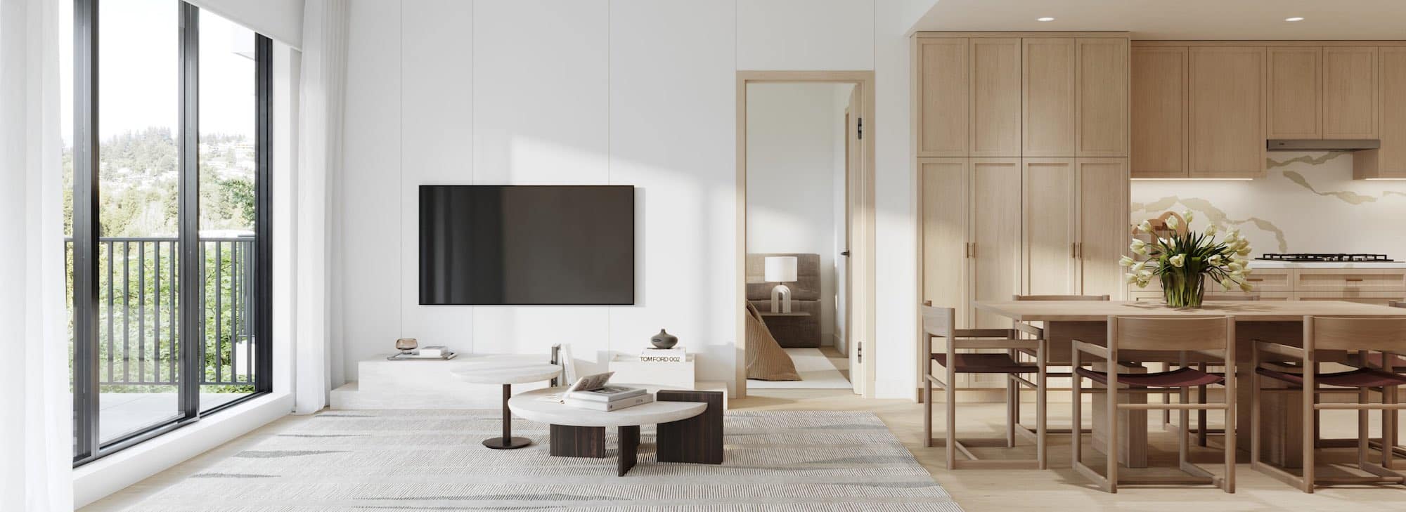 Open-concept living and kitchen space inside Siena Burnaby by Landa Global Properties at 4451 Hastings Street in Burnabyโs Vancouver Heights neighbourhood. The interior features wide windows for natural light