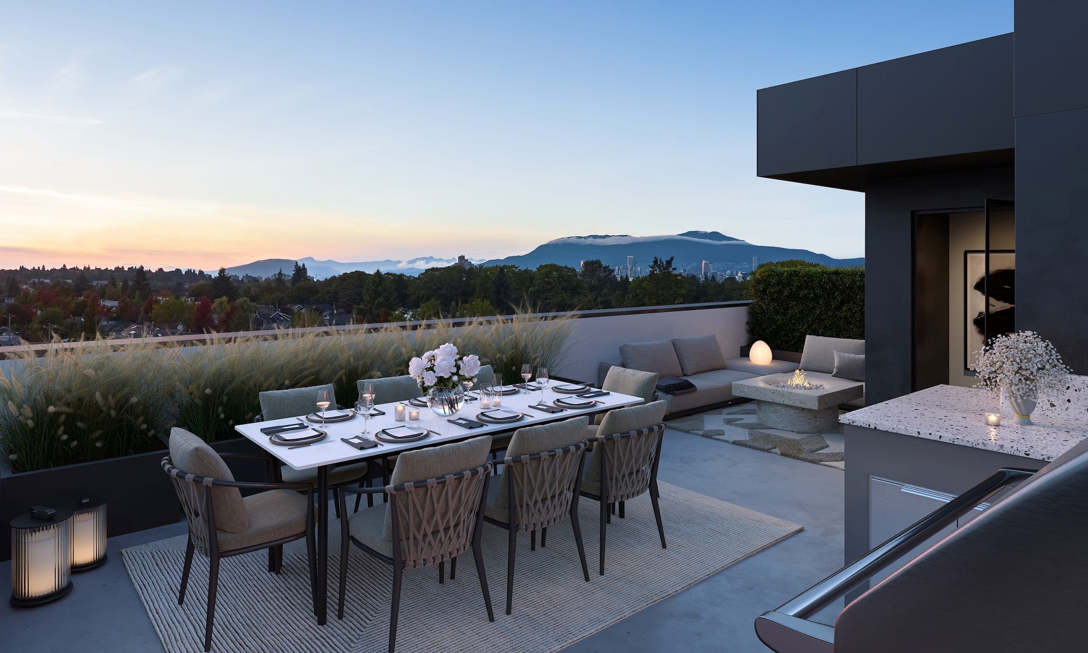 Rooftop terrace at King & Columbia Vancouver with dining area and mountain views