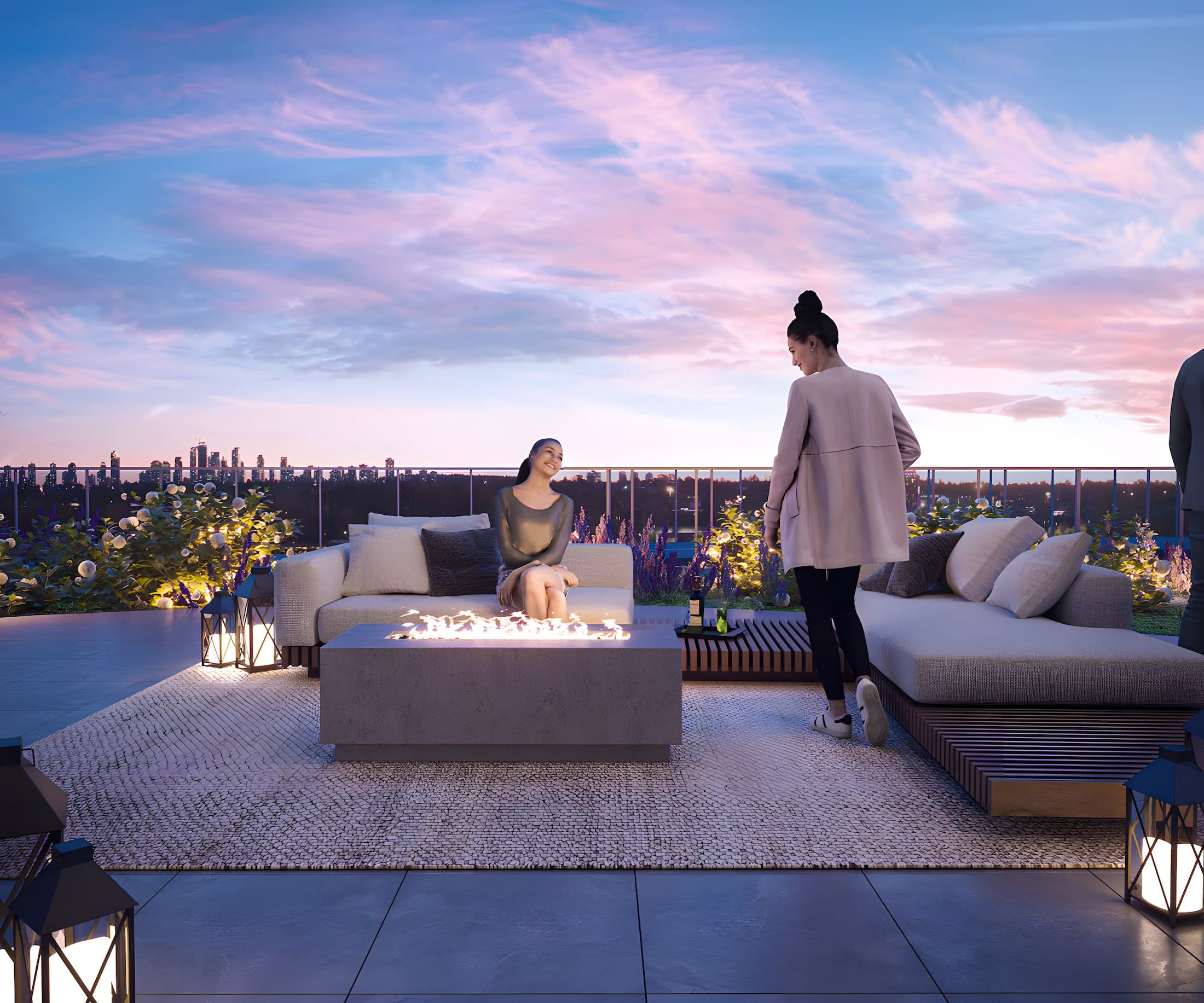 Rooftop lounge at Circle Brentwood with sunset skyline view in Burnaby