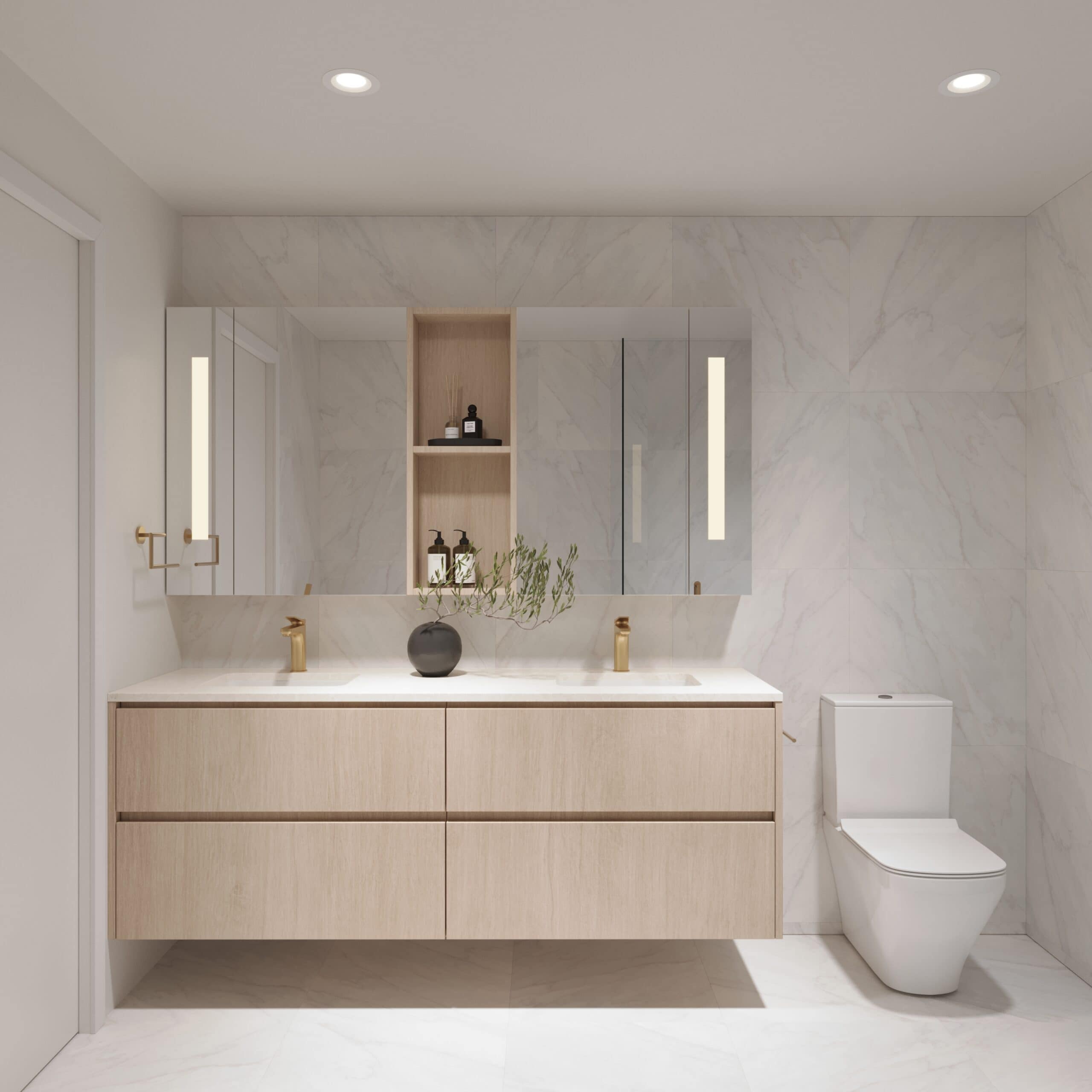 Double vanity bathroom interior at Siena Burnaby by Landa Global Properties located at 4451 Hastings Street in Burnabyโs Vancouver Heights neighbourhood. The space features floating wood cabinetry