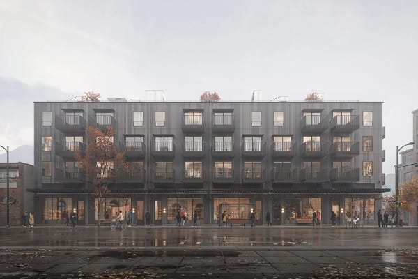 Streetscape view of Hem Vancouver by Hudson at 385 Lakewood Drive in Vancouver East, featuring a modern mid-rise building with balconies, ground-level retail, and pedestrians along a wet city street
