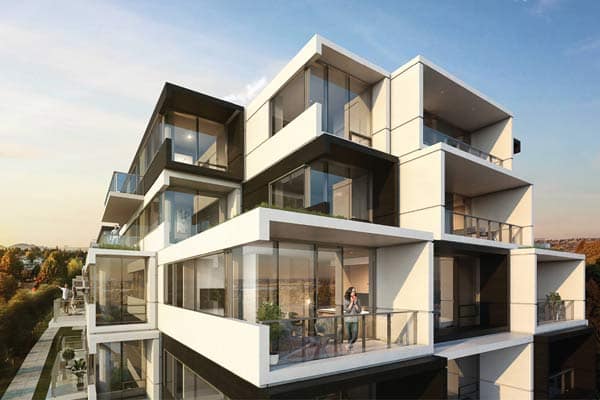 Corner exterior view of Oku Vancouver presale development in Marpole by Ulmus Development at 8030 Oak Street, showcasing contemporary architecture with large wraparound balconies, floor-to-ceiling windows, and clean geometric lines overlooking the neighbourhood.