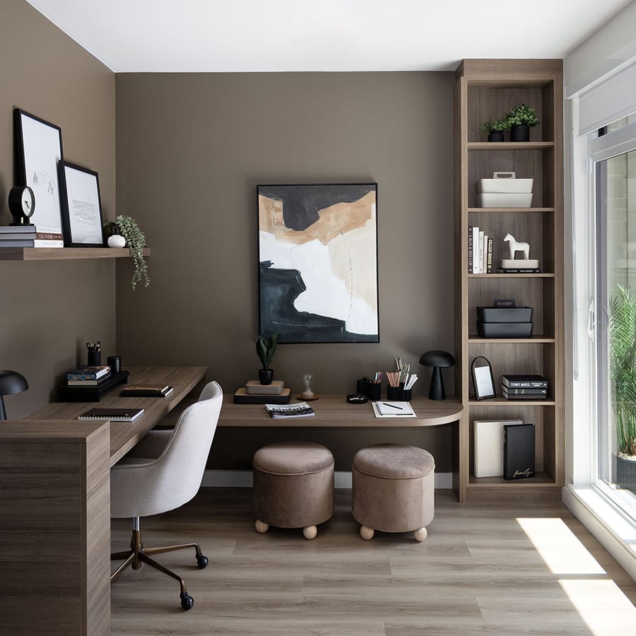 Flexible home office or den space at Rindall Port Coquitlam featuring built-in shelving, wide-plank flooring, and natural light in a modern Woodbridge townhome.
