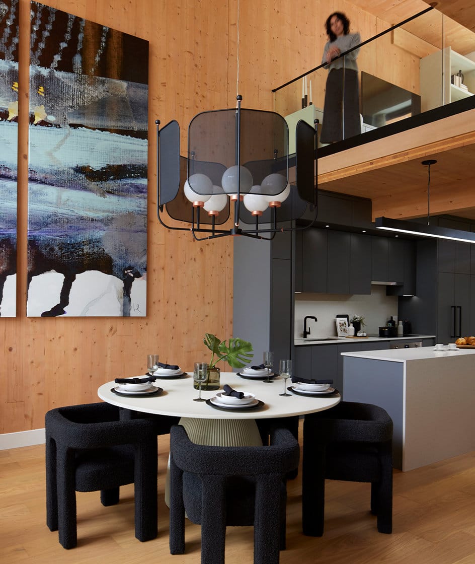Double-height dining area with CLT structure at Timber House New Westminster